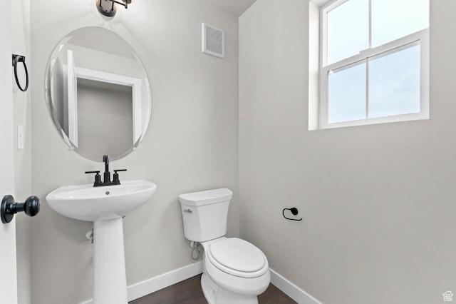 1918 S 2475 W, West Haven, UT 84401 - half bathroom featuring toilet and wood finished floors