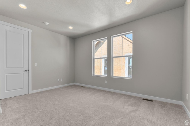 3932 W 2800 N, Lehi, UT 84043 - spare room featuring carpet floors, recessed lighting, and a textured ceiling