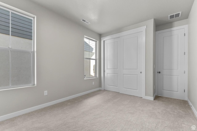 3932 W 2800 N, Lehi, UT 84043 - unfurnished bedroom with carpet flooring and a closet