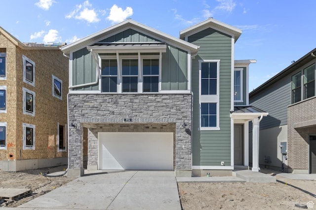 3932 W 2800 N, Lehi, UT 84043 - view of front of house with board and batten siding, stone siding, driveway, and a garage