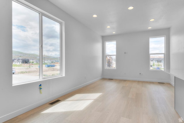 3908 W 2720 N, Lehi, UT 84043 - unfurnished room featuring light wood-type flooring and recessed lighting