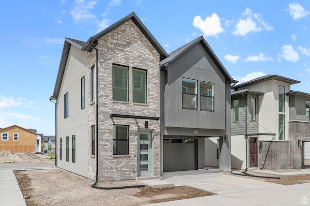 3908 W 2720 N, Lehi, UT 84043 - view of front of house with an attached garage, brick siding, concrete driveway, and stucco siding