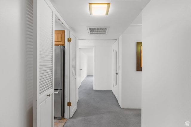 875 S Donner Way E Unit 302, Salt Lake City, UT 84108 - hallway with light carpet