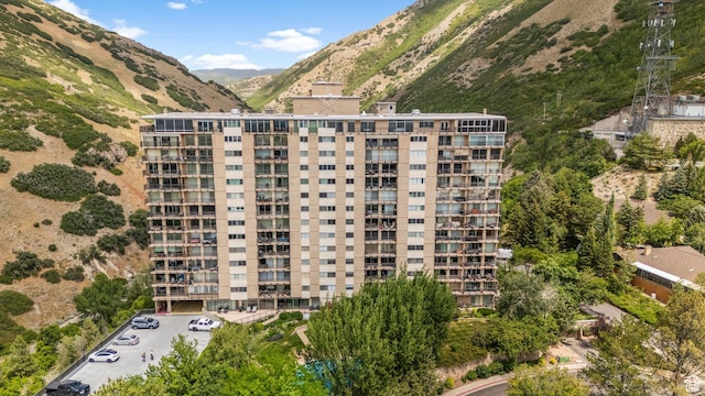 875 S Donner Way E Unit 302, Salt Lake City, UT 84108 - view of apartment building / complex with a mountain view