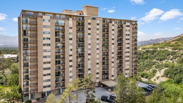 875 S Donner Way E Unit 302, Salt Lake City, UT 84108 - view of apartment building / complex featuring a mountain view