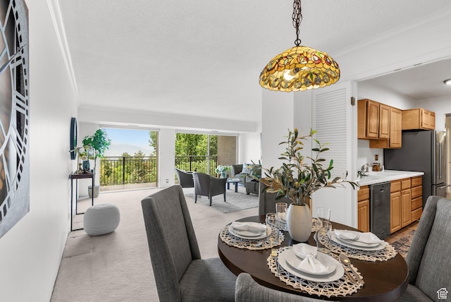 875 S Donner Way E Unit 302, Salt Lake City, UT 84108 - dining space featuring carpet flooring, ornamental molding, and a textured ceiling