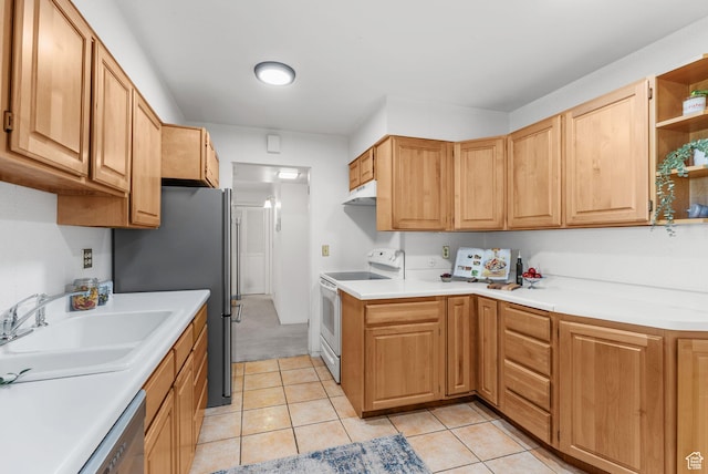 875 S Donner Way E Unit 302, Salt Lake City, UT 84108 - kitchen with appliances with stainless steel finishes, under cabinet range hood, light countertops, and light tile patterned flooring