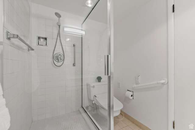 875 S Donner Way E Unit 302, Salt Lake City, UT 84108 - bathroom featuring a stall shower and tile patterned floors