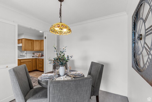 875 S Donner Way E Unit 302, Salt Lake City, UT 84108 - dining room with crown molding