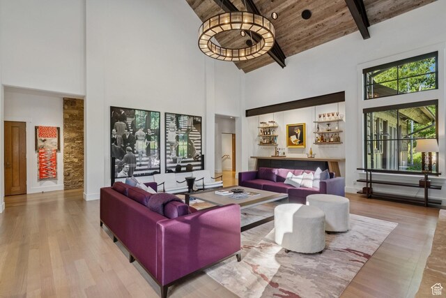 2505 W White Pine Ln, Park City, UT 84060 - living area with high vaulted ceiling, wood finished floors, and a wood ceiling with exposed beams