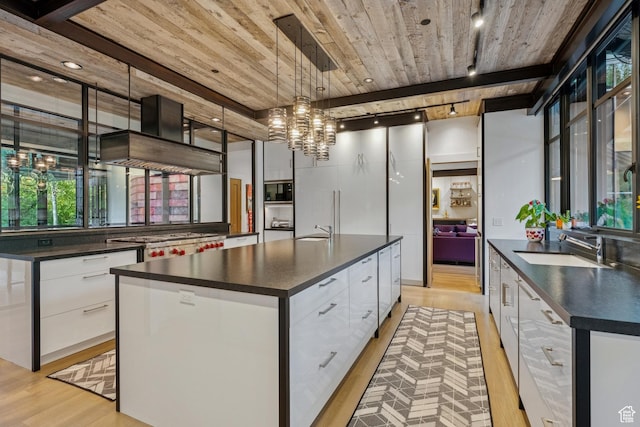 2505 W White Pine Ln, Park City, UT 84060 - kitchen featuring dark countertops, modern cabinets, track lighting, white cabinets, and wooden ceiling