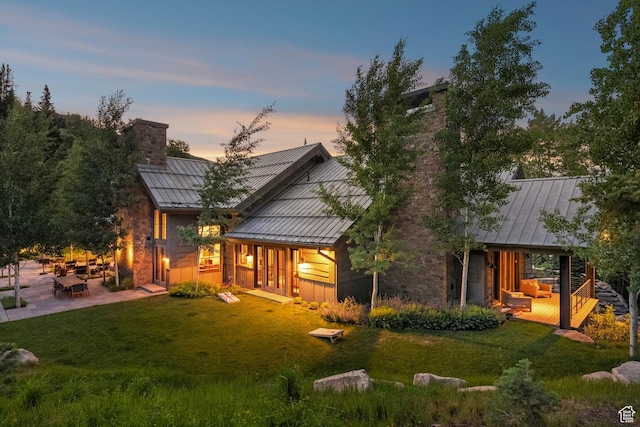 2505 W White Pine Ln, Park City, UT 84060 - back of property featuring a standing seam roof, a chimney, and a metal roof