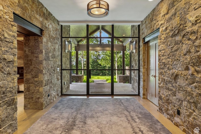 2505 W White Pine Ln, Park City, UT 84060 - doorway featuring wood finished floors and expansive windows