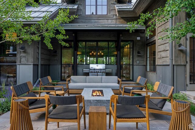 2505 W White Pine Ln, Park City, UT 84060 - view of patio / terrace with an outdoor living space with a fire pit