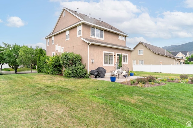 17 S Belmont Dr, Farmington, UT 84025 - rear view of house with stucco siding, a patio, and roof with shingles