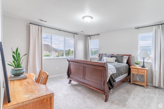 17 S Belmont Dr, Farmington, UT 84025 - bedroom featuring light colored carpet and a textured ceiling