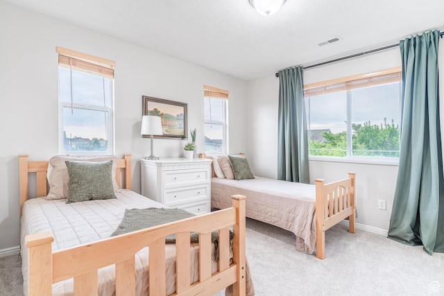 17 S Belmont Dr, Farmington, UT 84025 - bedroom featuring light colored carpet and baseboards