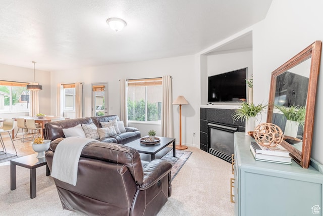 17 S Belmont Dr, Farmington, UT 84025 - living area featuring light colored carpet and a fireplace