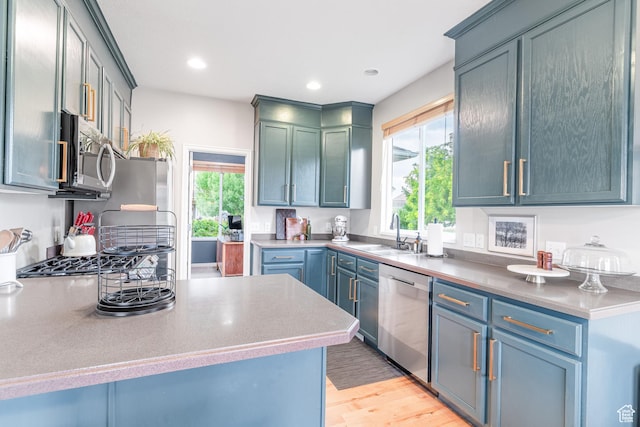 17 S Belmont Dr, Farmington, UT 84025 - kitchen with appliances with stainless steel finishes, light wood-style floors, and recessed lighting