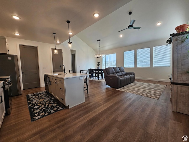 964 E 50 S, Santaquin, UT 84655 - kitchen featuring ceiling fan, stainless steel electric stove, lofted ceiling, dark wood-type flooring, and light countertops