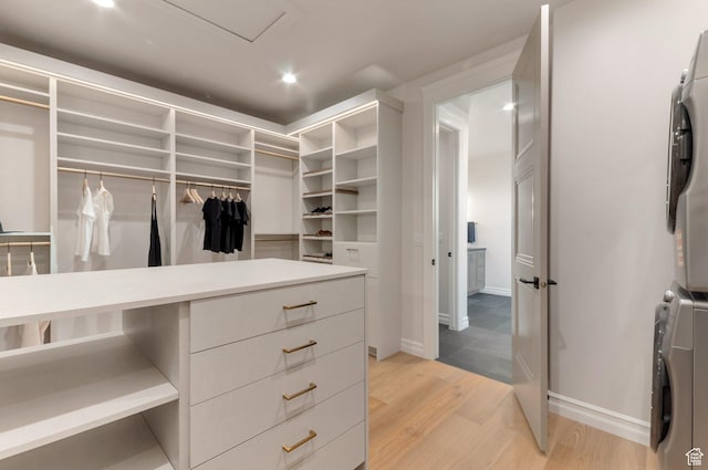 1649 W Pheasant Meadow Dr, Kaysville, UT 84037 - spacious closet featuring estacked washer and dryer and light wood finished floors