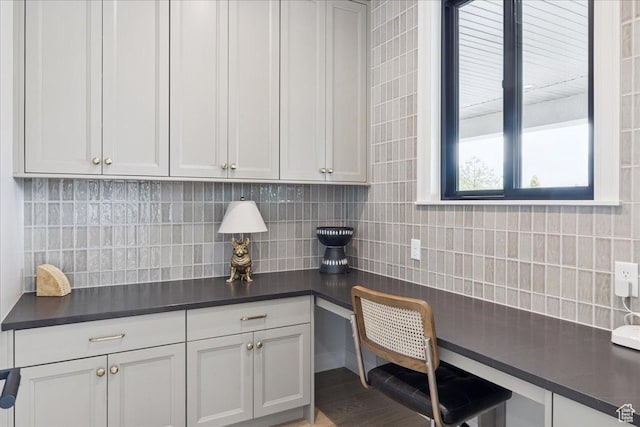 1649 W Pheasant Meadow Dr, Kaysville, UT 84037 - kitchen featuring dark countertops, tasteful backsplash, and a desk