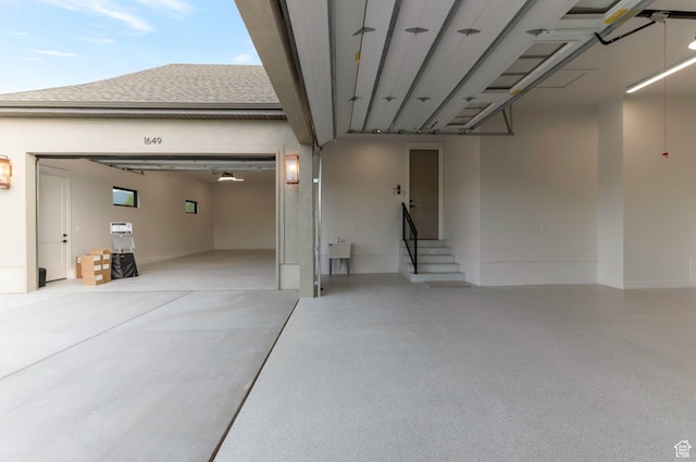 1649 W Pheasant Meadow Dr, Kaysville, UT 84037 - garage featuring concrete driveway and a sink