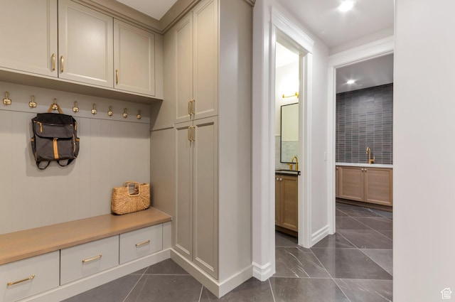 1649 W Pheasant Meadow Dr, Kaysville, UT 84037 - mudroom with baseboards and dark tile patterned flooring