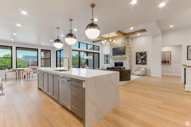 1649 W Pheasant Meadow Dr, Kaysville, UT 84037 - kitchen featuring gray cabinetry, plenty of natural light, light wood-style flooring, stainless steel dishwasher, and recessed lighting
