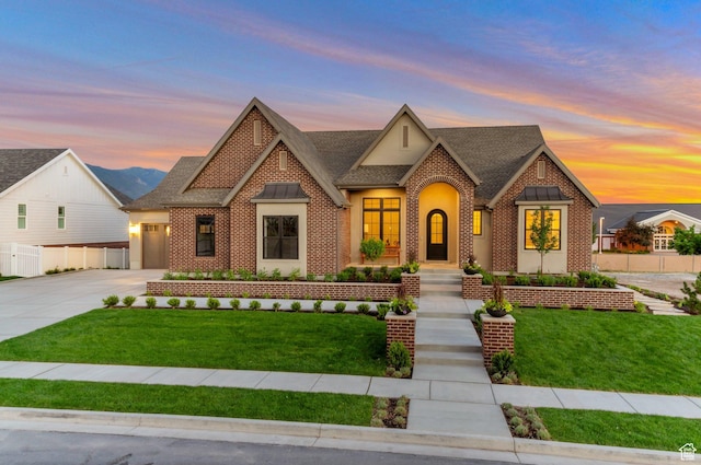 1649 W Pheasant Meadow Dr, Kaysville, UT 84037 - view of front of home with roof with shingles, concrete driveway, brick siding, and an attached garage