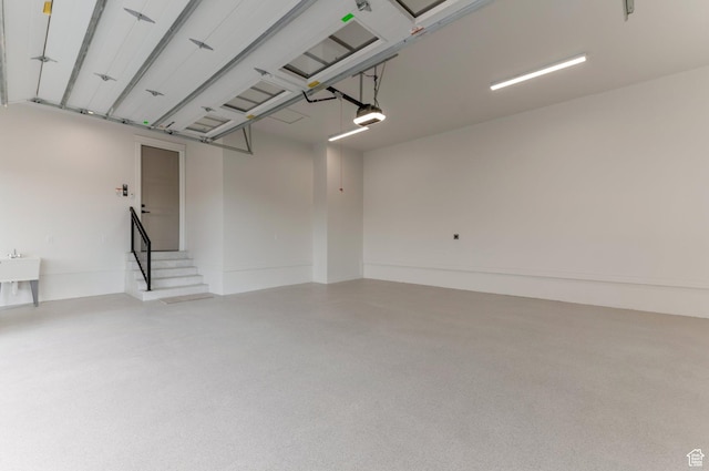 1649 W Pheasant Meadow Dr, Kaysville, UT 84037 - garage featuring a garage door opener