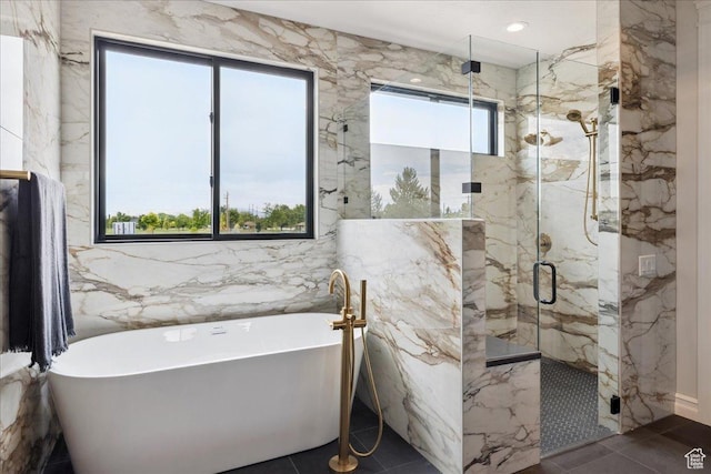 1649 W Pheasant Meadow Dr, Kaysville, UT 84037 - bathroom featuring healthy amount of natural light, a freestanding tub, a marble finish shower, and tile walls