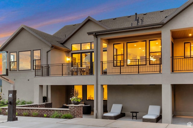 1649 W Pheasant Meadow Dr, Kaysville, UT 84037 - rear view of house featuring a balcony, a patio, stucco siding, and roof with shingles