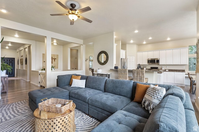 2151 E Village Vista Dr, Draper, UT 84020 - living room with wood finished floors, ceiling fan, and recessed lighting
