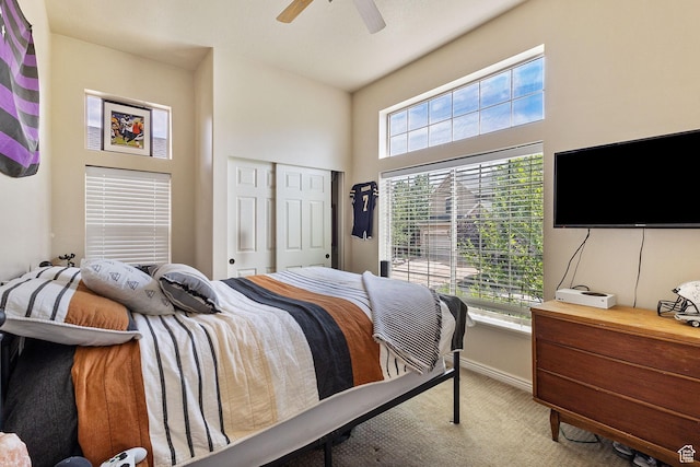 2151 E Village Vista Dr, Draper, UT 84020 - bedroom featuring light colored carpet, a ceiling fan, and a closet