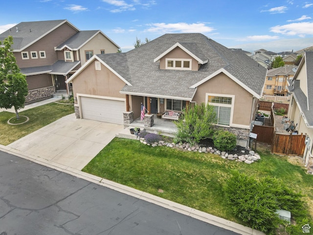2151 E Village Vista Dr, Draper, UT 84020 - view of front of property featuring a shingled roof, stone siding, covered porch, and stucco siding