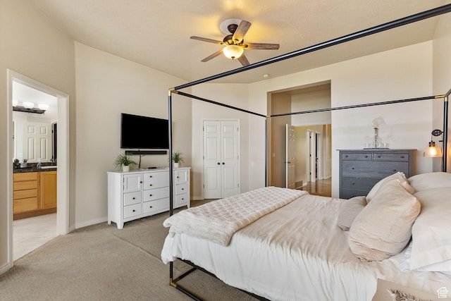 2151 E Village Vista Dr, Draper, UT 84020 - bedroom with light carpet, connected bathroom, and a ceiling fan