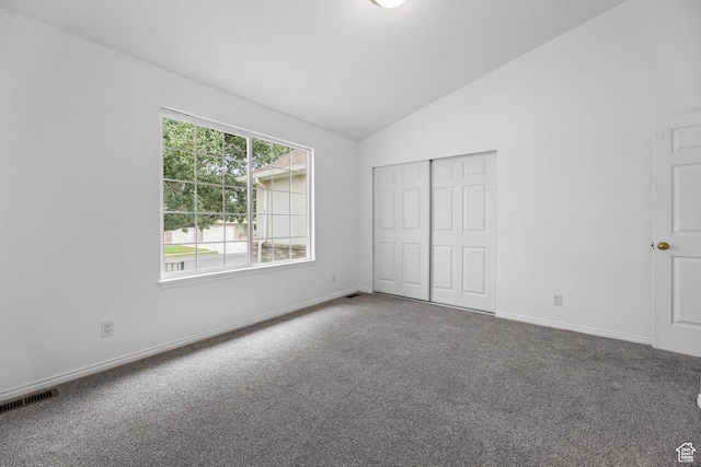 9448 S Lady Dove Ln, South Jordan, UT 84095 - unfurnished bedroom with carpet flooring, lofted ceiling, and a closet