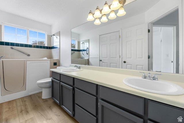 9448 S Lady Dove Ln, South Jordan, UT 84095 - full bathroom with double vanity, wood finished floors, and a shower