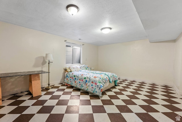 9448 S Lady Dove Ln, South Jordan, UT 84095 - bedroom featuring tile patterned floors and a textured ceiling