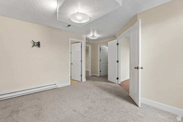 9448 S Lady Dove Ln, South Jordan, UT 84095 - unfurnished bedroom with light carpet, a baseboard radiator, and a textured ceiling