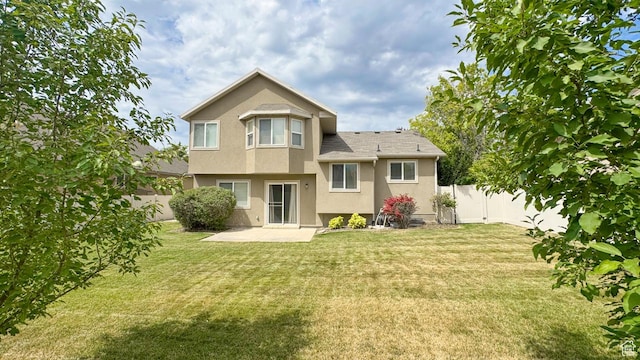 2188 N 2270 W, Lehi, UT 84043 - back of property with stucco siding, a fenced backyard, and a patio
