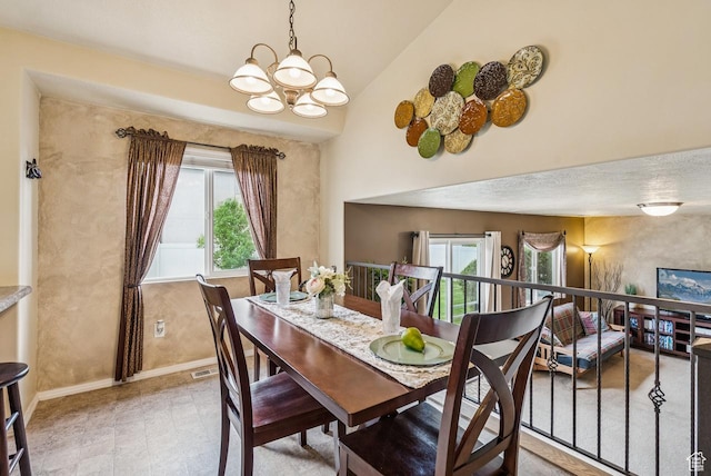 2188 N 2270 W, Lehi, UT 84043 - dining room featuring a chandelier, healthy amount of natural light, and lofted ceiling