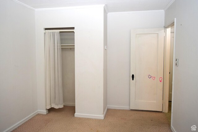 519 Edgehill Pl, East Carbon, UT 84520 - unfurnished bedroom with carpet floors, ornamental molding, and a closet