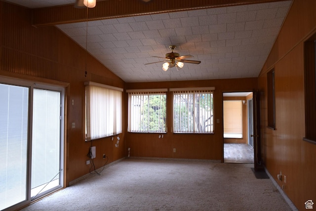 519 Edgehill Pl, East Carbon, UT 84520 - unfurnished room with ceiling fan, lofted ceiling, wooden walls, and carpet floors