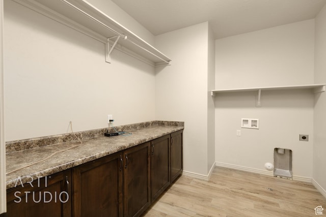 2866 E Carmine Dr, St George, UT 84790 - washroom with electric dryer hookup, hookup for a washing machine, light wood-style flooring, cabinet space, and gas dryer hookup