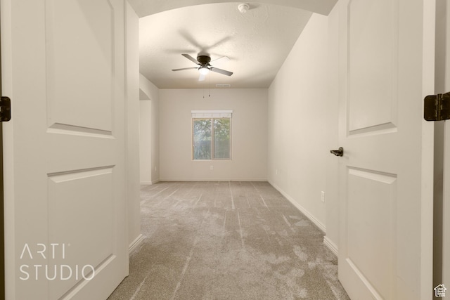 2866 E Carmine Dr, St George, UT 84790 - unfurnished room with carpet, a ceiling fan, a textured ceiling, and a smoke detector