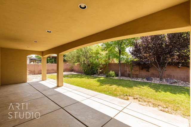 2866 E Carmine Dr, St George, UT 84790 - fenced backyard with a patio area
