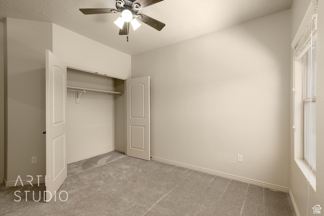 2866 E Carmine Dr, St George, UT 84790 - unfurnished bedroom with carpet, a closet, and ceiling fan