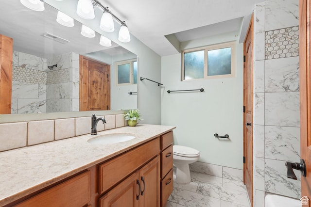 3020 Cherokee Ln, Provo, UT 84604 - bathroom with marble finish floors, vanity, and a shower
